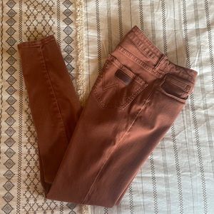 Wrangler retro women’s skinny jeans. Orange/rust color. Size 9, inseam 31.